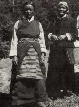 Tibetan women wearing traditional dresses.