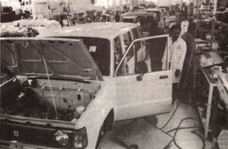 An automobile assembly line at a Kenyan-American joint venture. XIN HUA