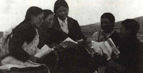 A Tibetan teacher (middle) and her students. JIAO WEI