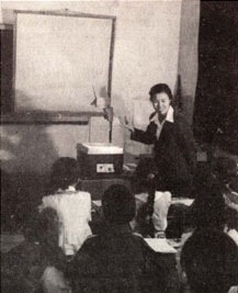 Slides are shown at a class in the Bailingzhuang Primary School. XIN HUA